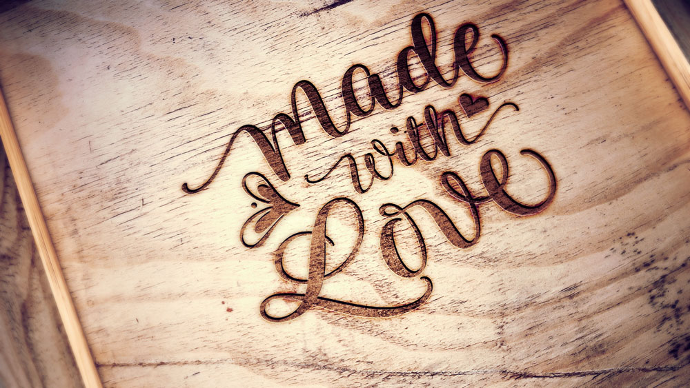 Wood piece with Made With Love laser engraving
